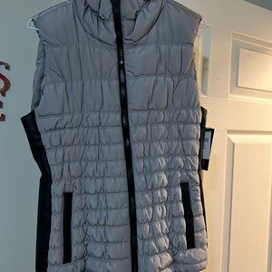 Silver vest with leather side strips